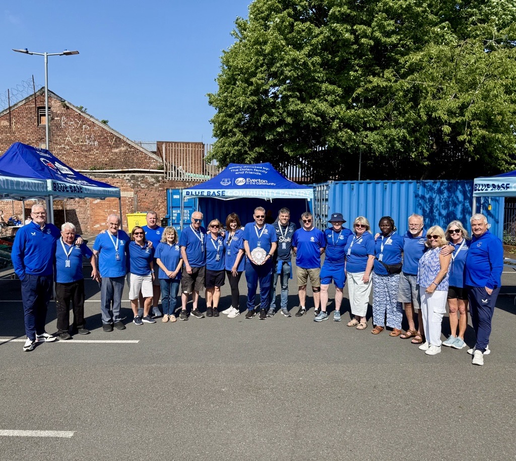 Everton legends surprise dedicated volunteer with special award 
